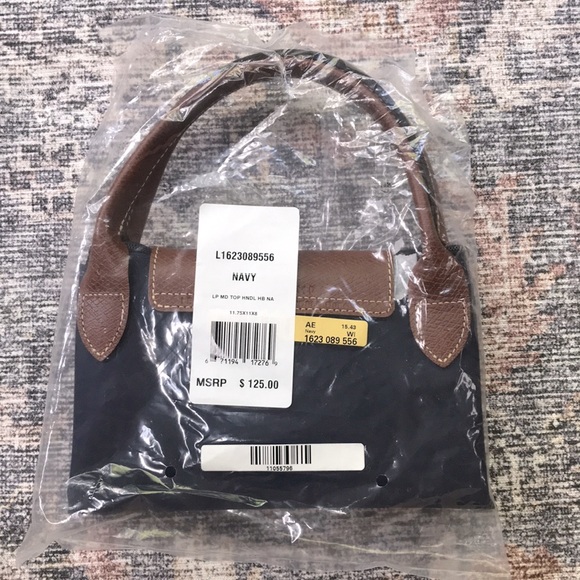 Longchamp Handbags - LONGCHAMP Navy Le Pliage Med Top Handle Bag (NWT)